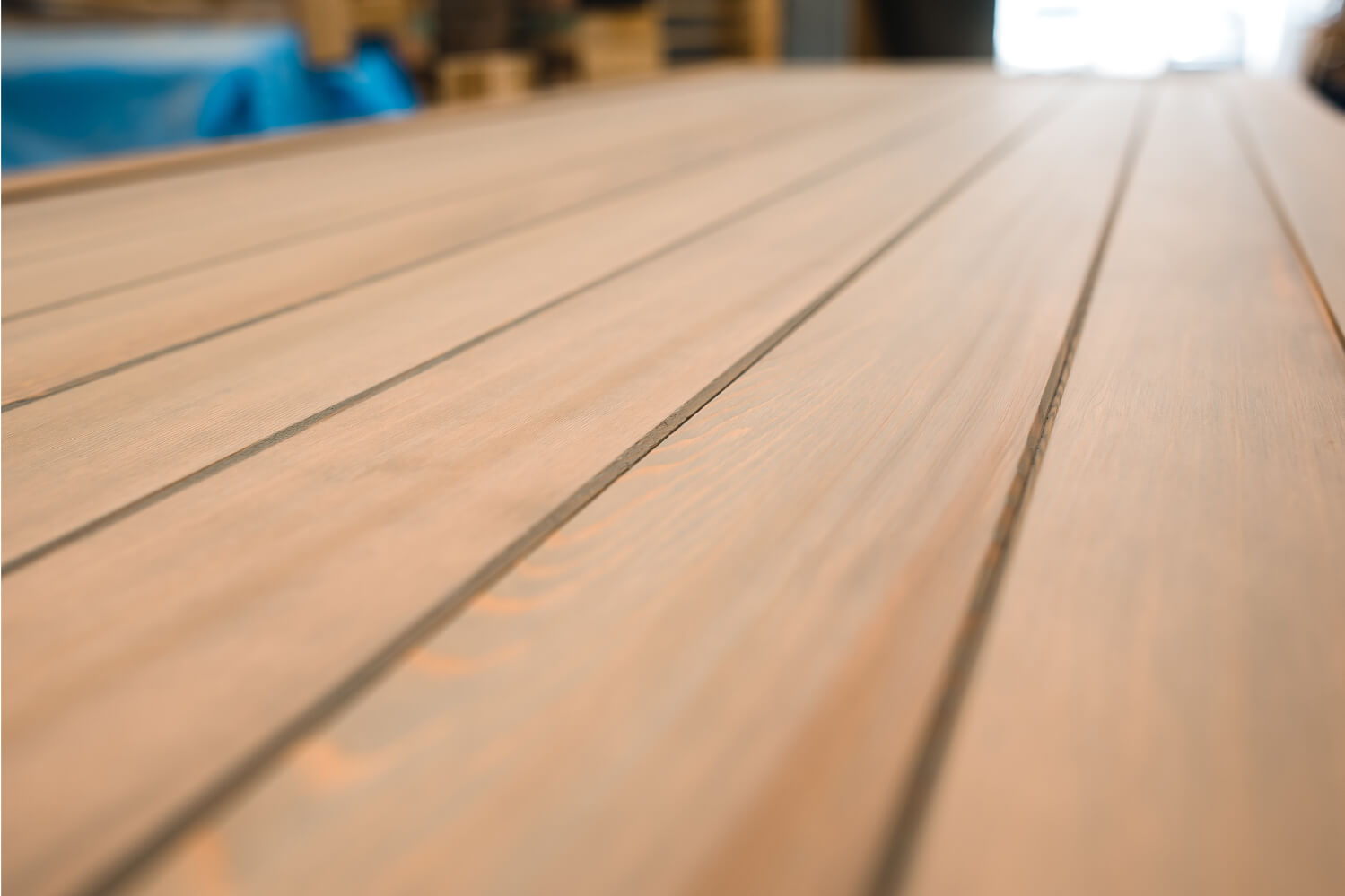 Close up photo of a varnished and treated wooden door